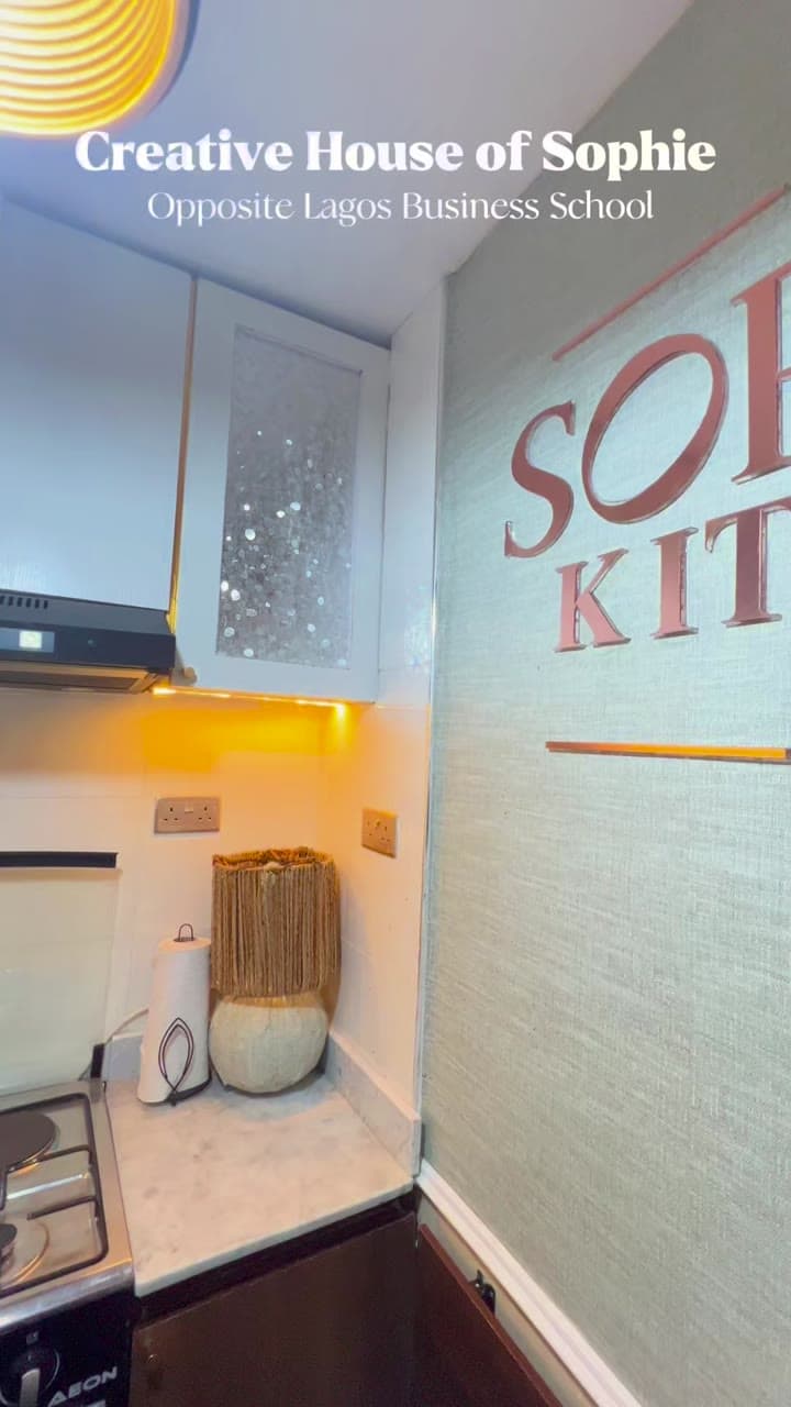 The Sophie's Kitchen sign in rose-gold lettering